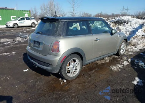 2009 Mini Cooper S z USA, uszkodzony, nr VIN WMWMF735X9TW87772
